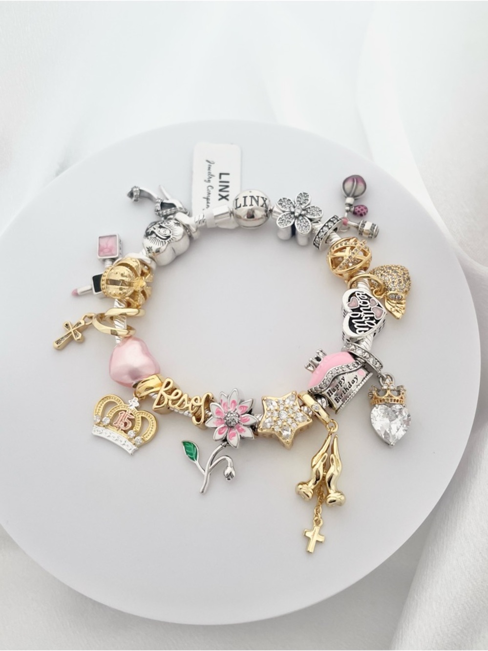 Linx Yellow Gold Bracelet with Gold Silver and Pink Quinceanera Charms